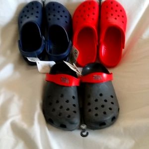Crocs new tags still on them navy, red, and Carolina gamecocks